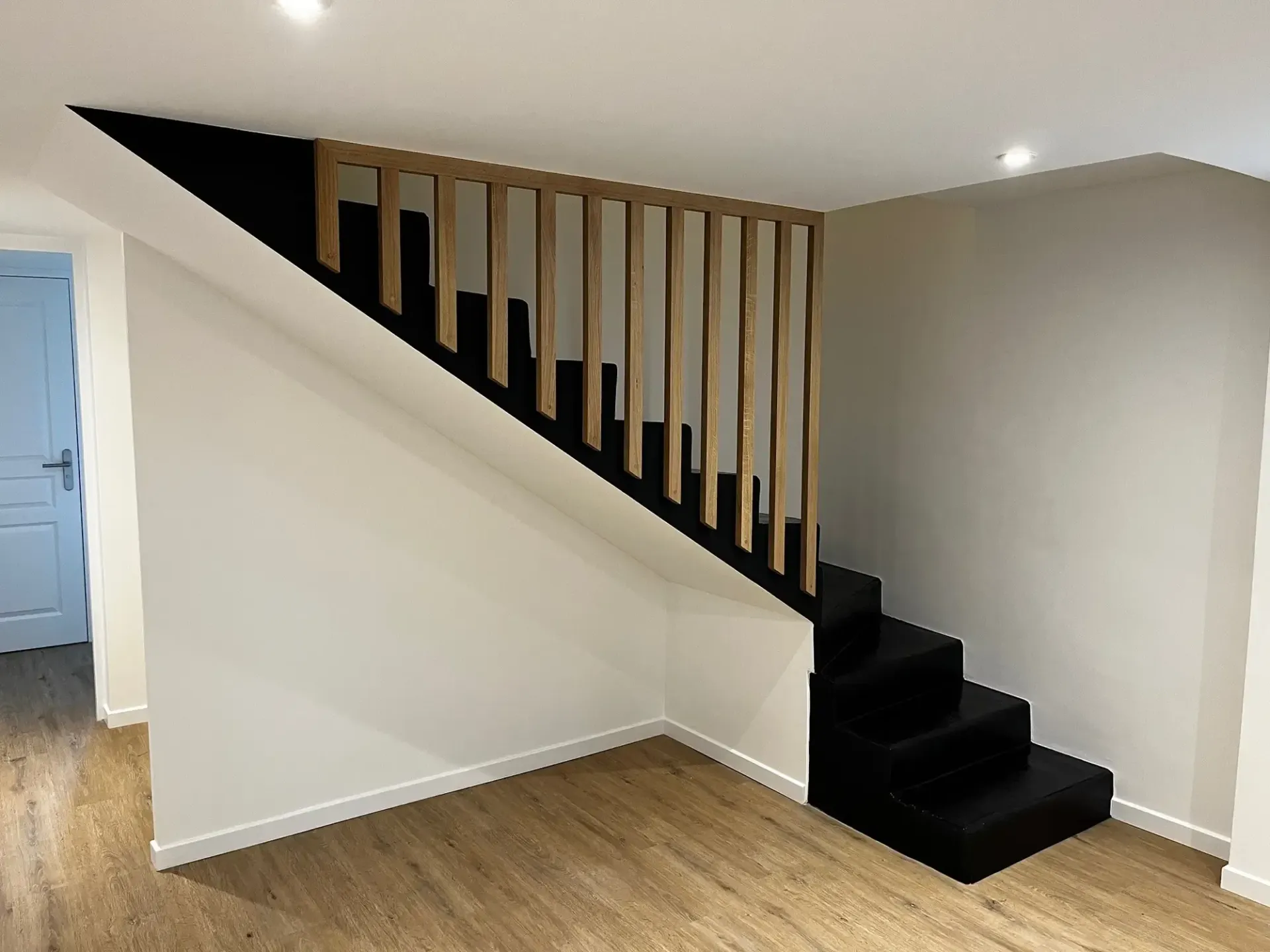 Rénovation du sous-sol d'une maison par 2B Groupe